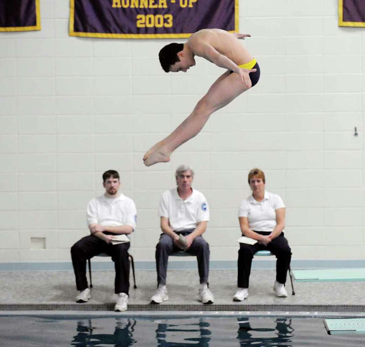 Sean Burston of Westhill/Stamford Co-op competes in the FCIAC diving championships at Westhill High School in Stamford, Friday, Match 2, 2012. Burston won the event.