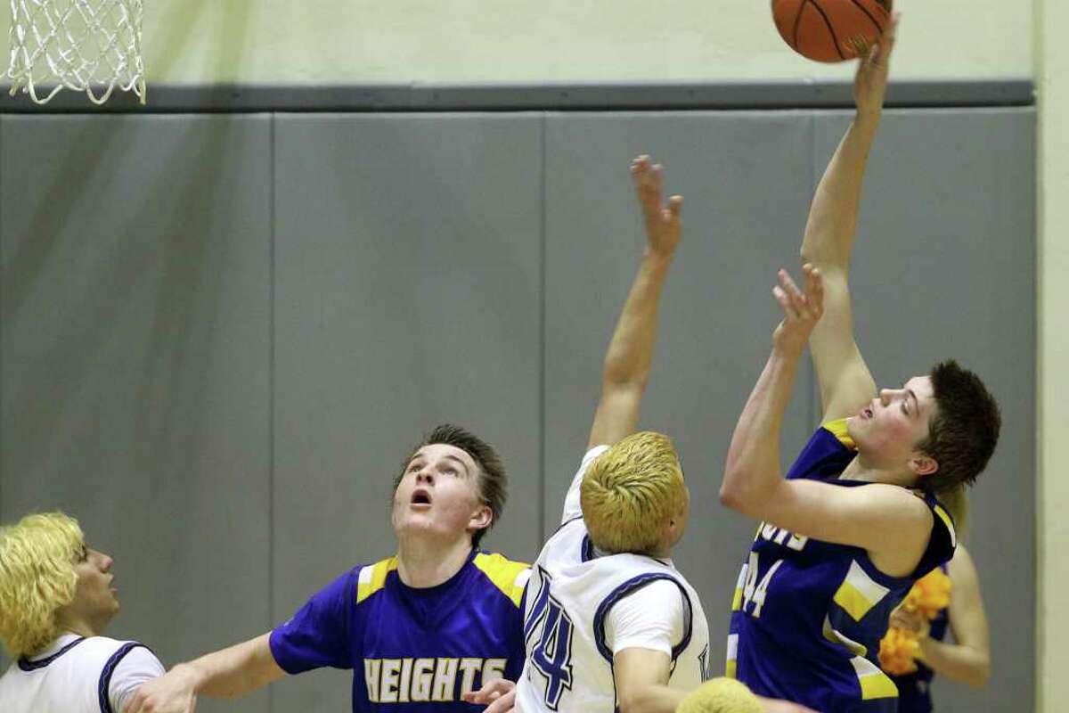 Heights' Ben lammers shoots in the first half. Alamo Heights beat Lanier 72-58 in the Region IV-4A semifinals at Littleton Gymnasium, Friday, March 2, 2012. (JENNIFER WHITNEY)