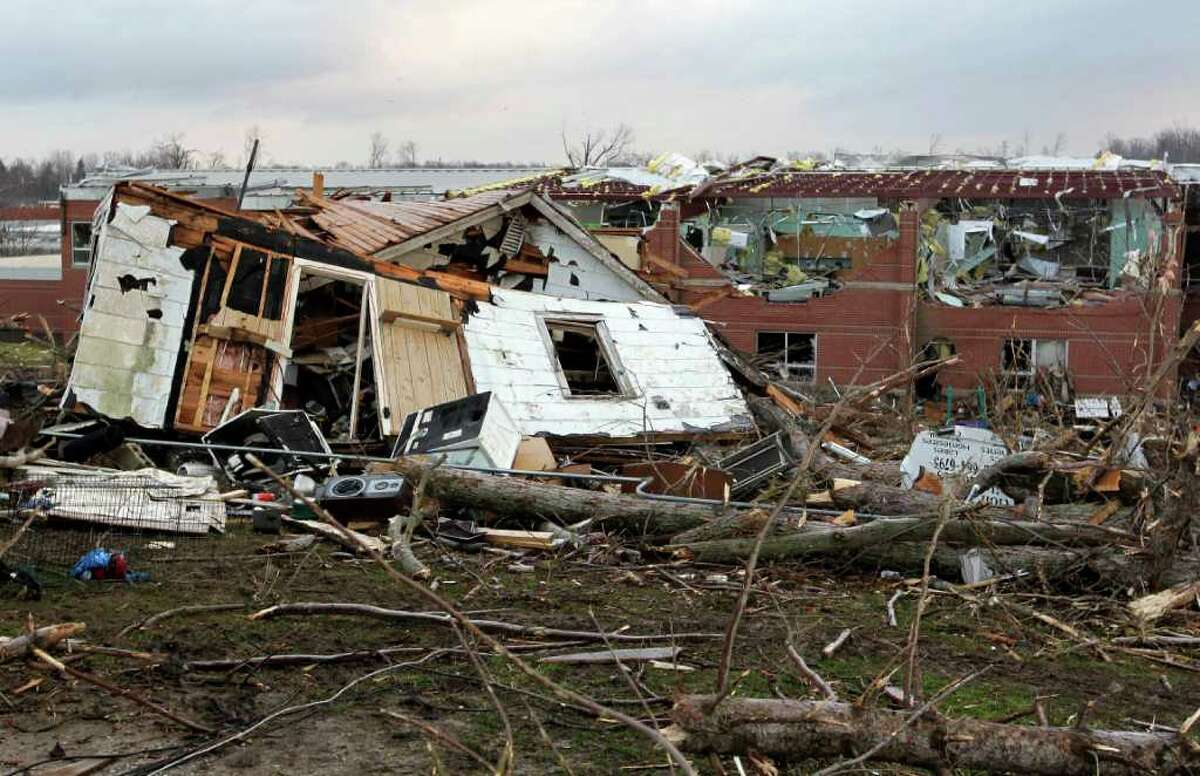 News of the world in photos: Towns vanish in deadly storms