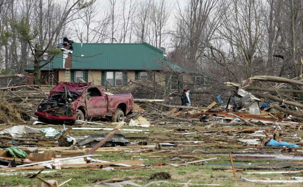 News of the world in photos: Towns vanish in deadly storms