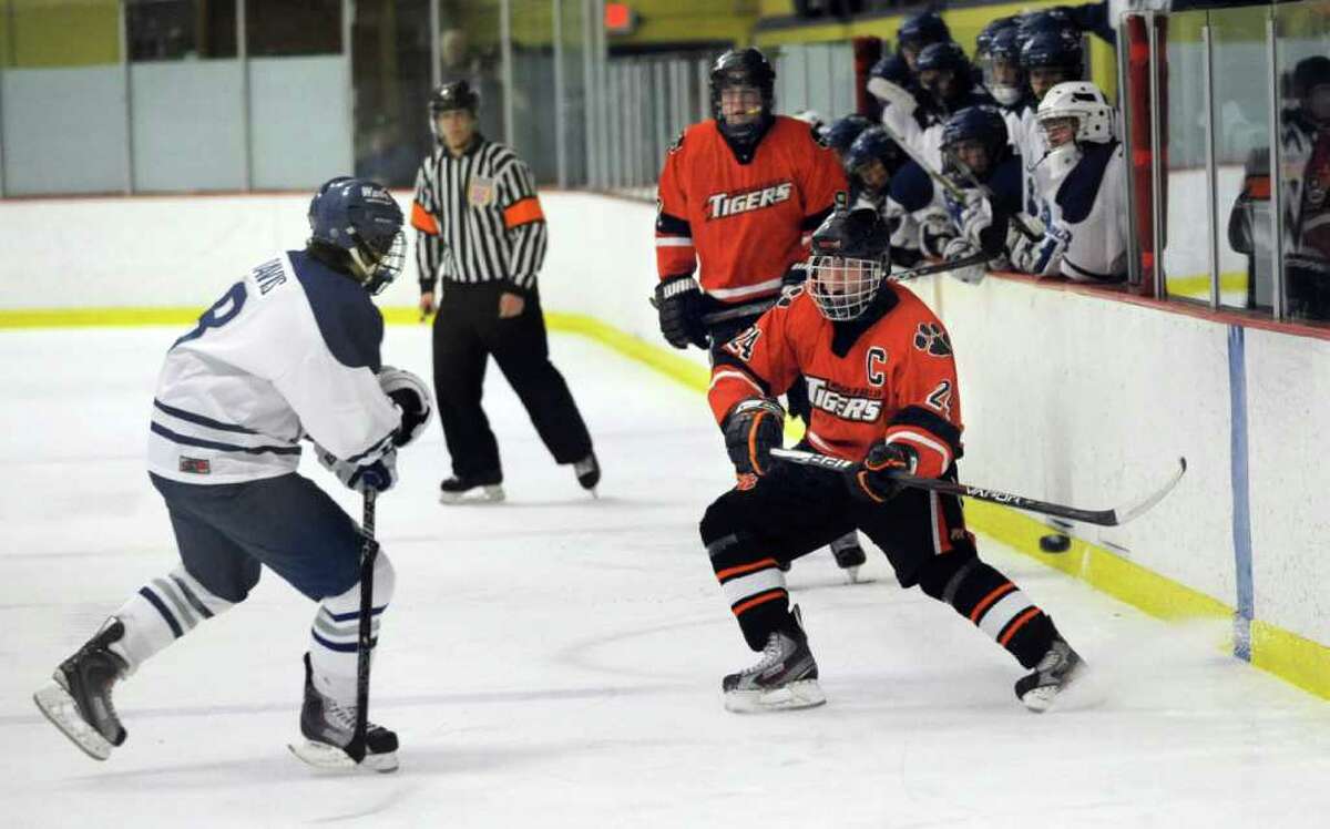 Ridgefield boys hockey nips Darien, 3-2 to win FCIAC Tier 1 title