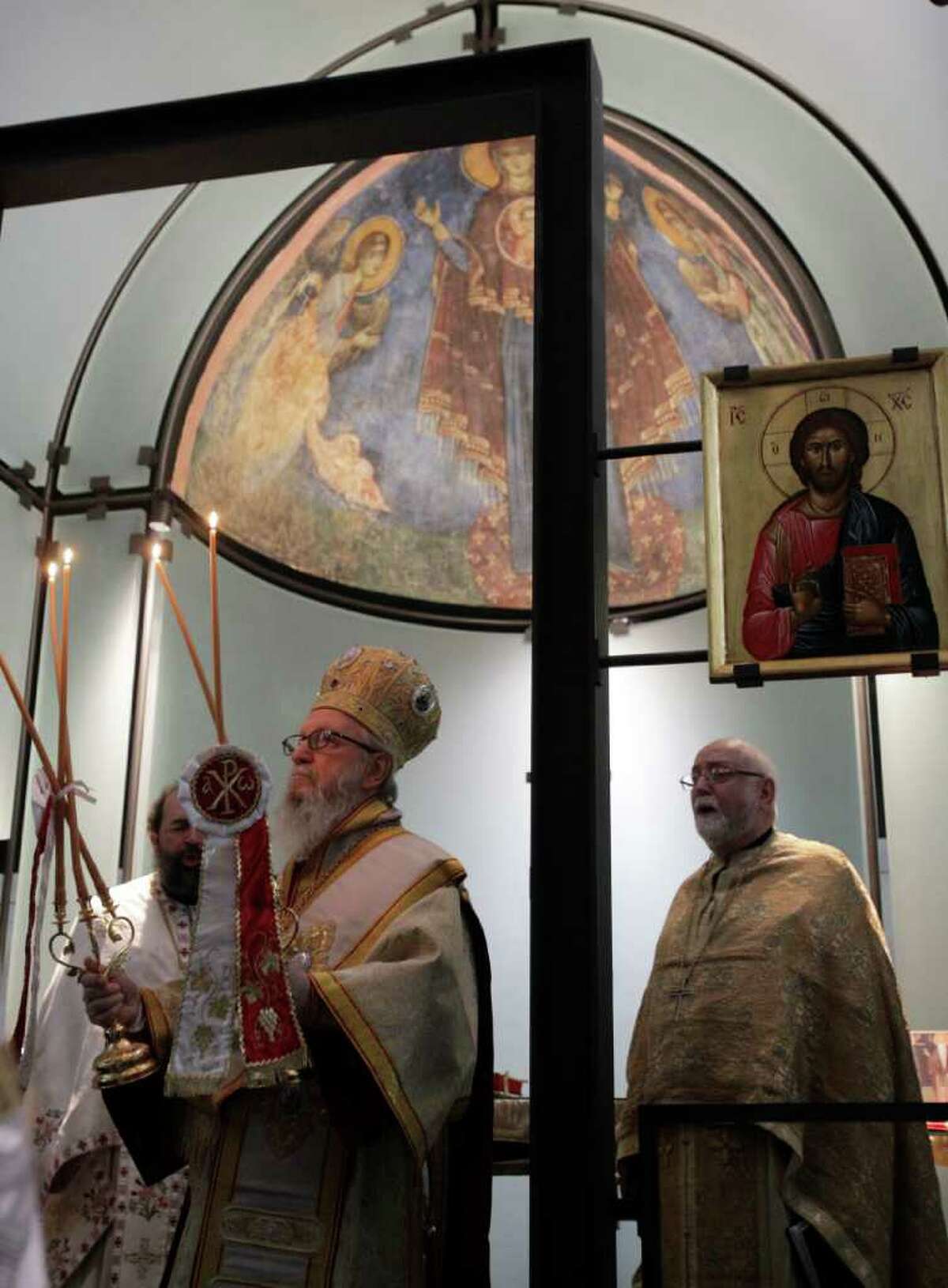 In the Menil Collection's Byzantine Fresco Chapel on Saturday, Archbishop Demetrios, of the Greek Orthodox Church in America, takes part in farewell ceremonies marking the return of frescoes to Cyprus. The 700-year-old Byzantine frescoes are set to return to the Mediterranean island later this month.