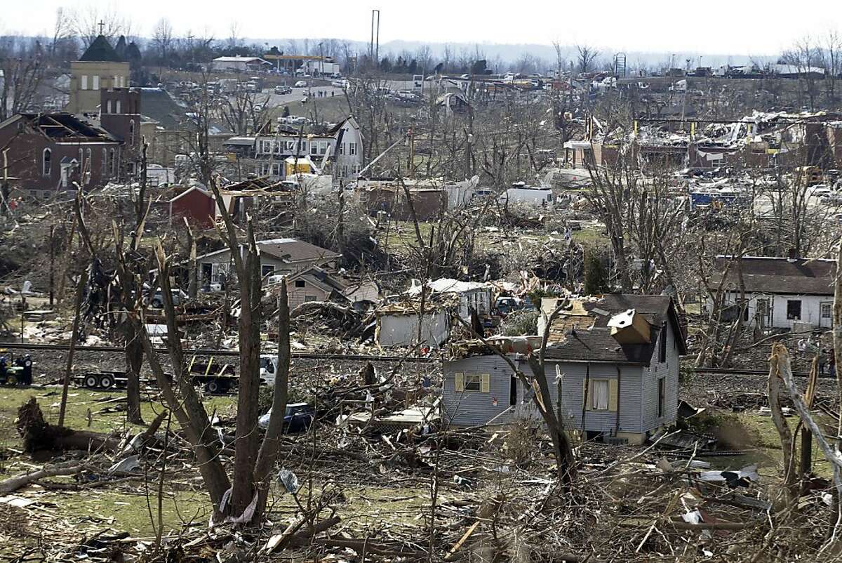 Tornado survivors emerge to find devastation