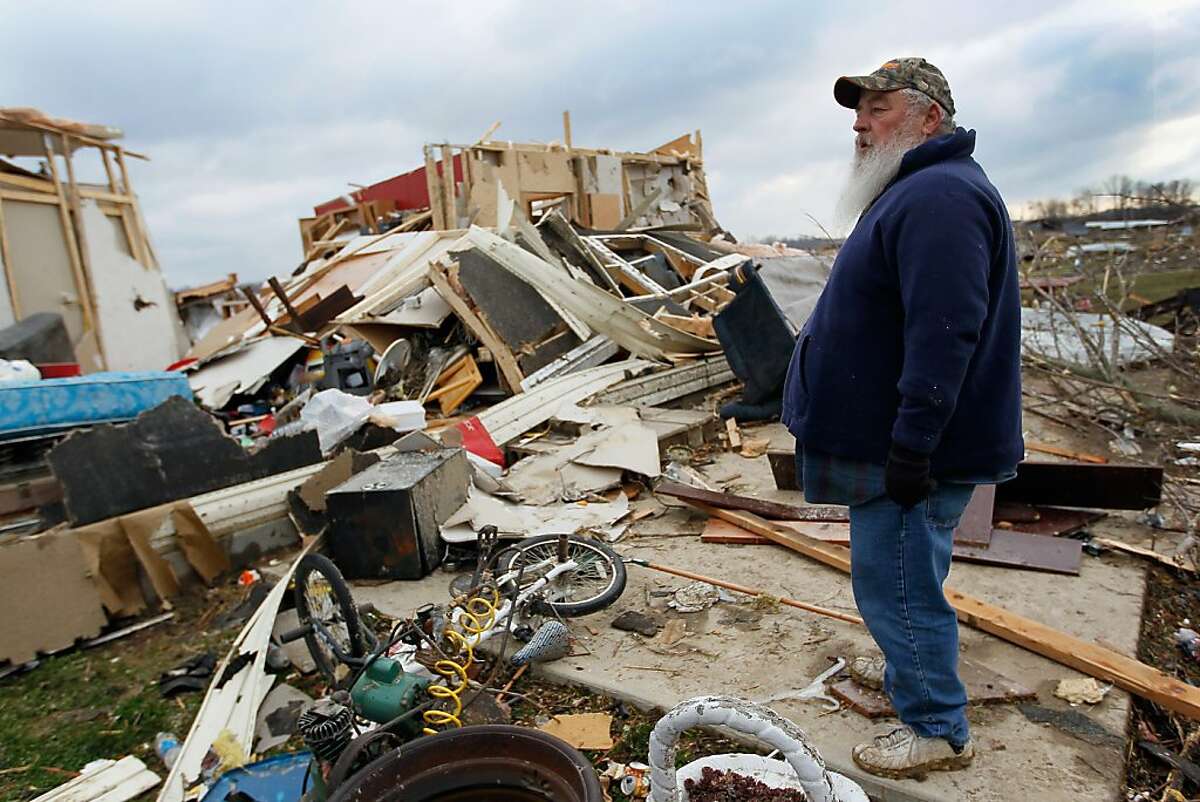 Tornado survivors emerge to find devastation