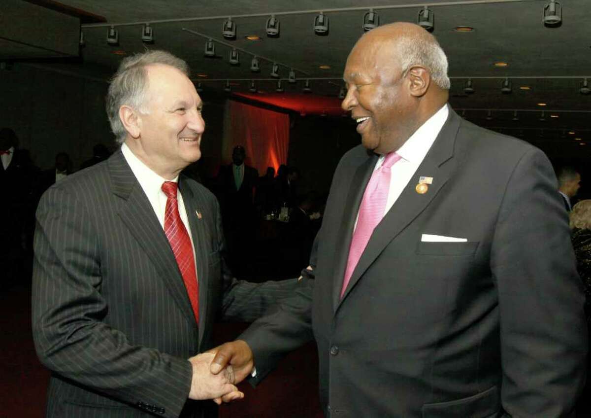 Albany, NY - February 19, 2012 - (Photo by Joe Putrock/Special to the Times Union) - 2012 US Senate hopeful George Maragos, left, greets Jim Garner during the NYS Black & Puerto Rican Caucus.