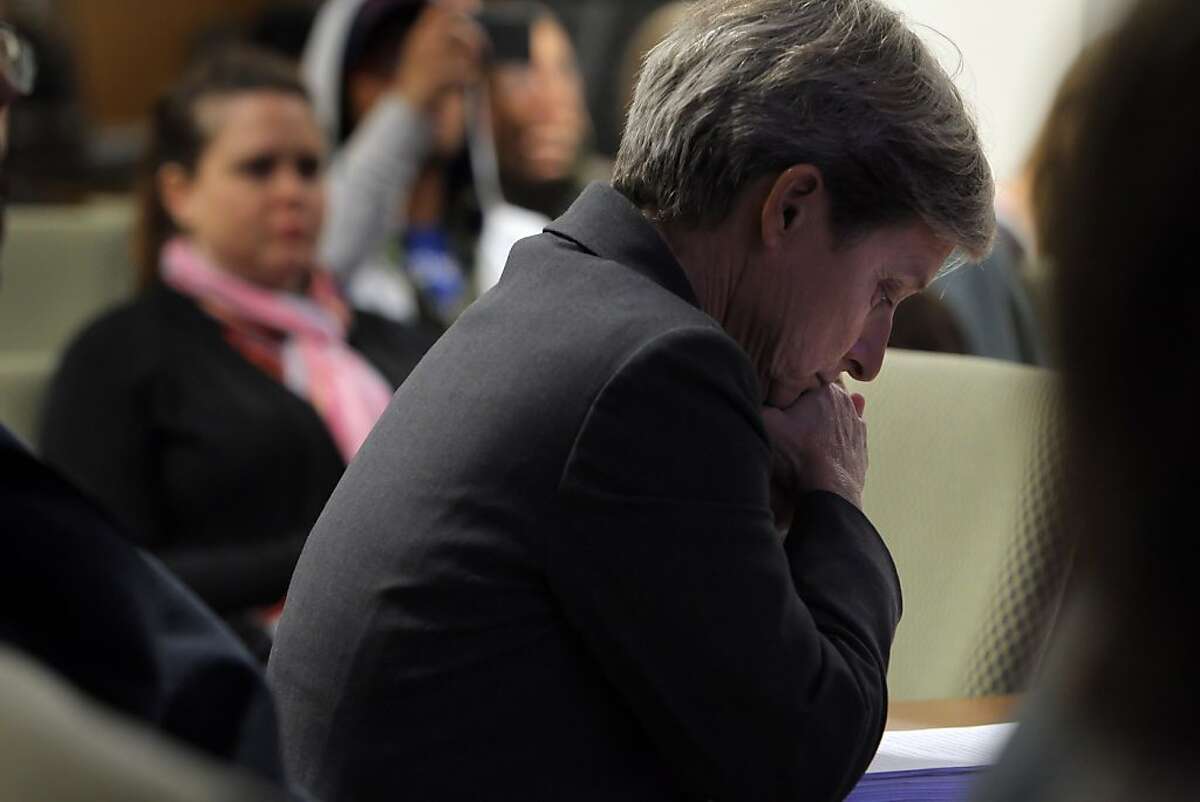 Prof. Judith Butler puts her head down as she listens to a video presented to the UC Berkeley Police Review Board in Berkeley, Calif, on Monday, March 5, 2012. The UC Berkeley Police Review Board exmained the events at Sproul Plaza on Nov. 9 when an Occupy encampment resulted in a batton-wielding clash between protesters and campus police.