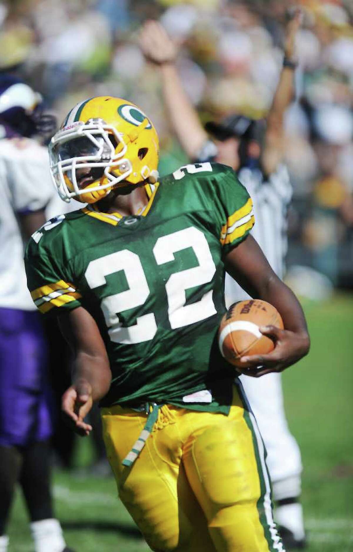 Trinity Catholic High School's Shaquan Howsie scores a touchdown against Westhill High School in city rivalry football action at Trinity in Stamford, Conn. on Saturday October 2, 2010.