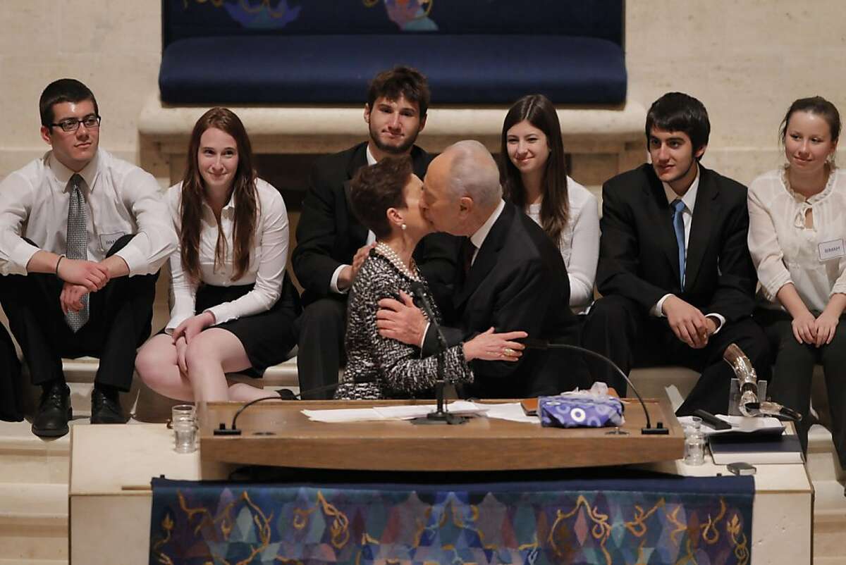 Israeli President Shimon Peres greets Roselyne Swig after he spoke to thousands gathered at Congregation Emanu-El in San Francisco, Calif., on Tuesday, March 6, 2012.