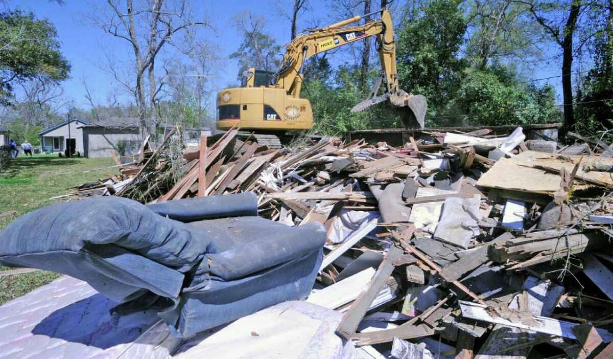 Residents hope demolition of vacant homes will run out the 'devil'