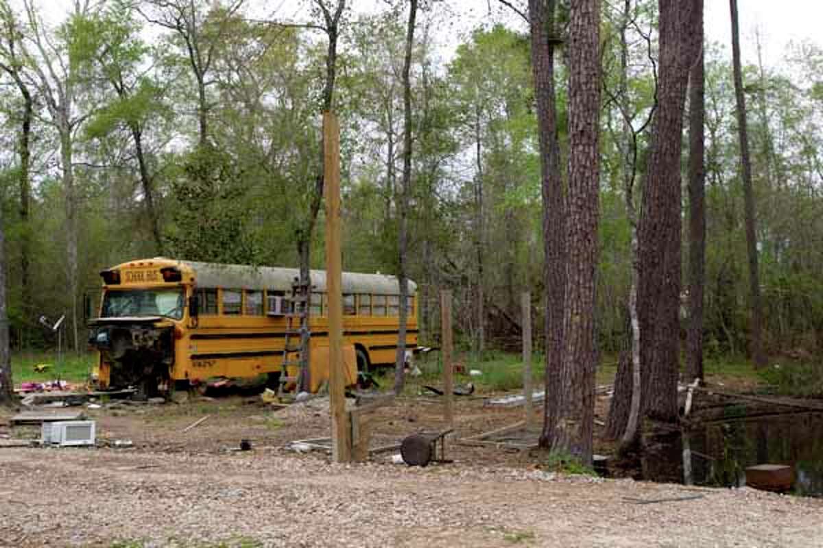 An old school bus is said to be where two young children were found living on Wednesday in Spendora. An 11-year-old girl was found with her 5-year-old brother. Both of the children's parents are in prison, officials said.