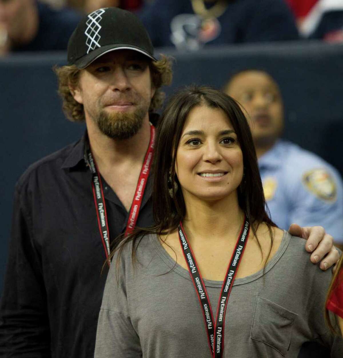 MLB's Jeff Bagwell touches girlfriend Rachel Brown at Houston Astros game