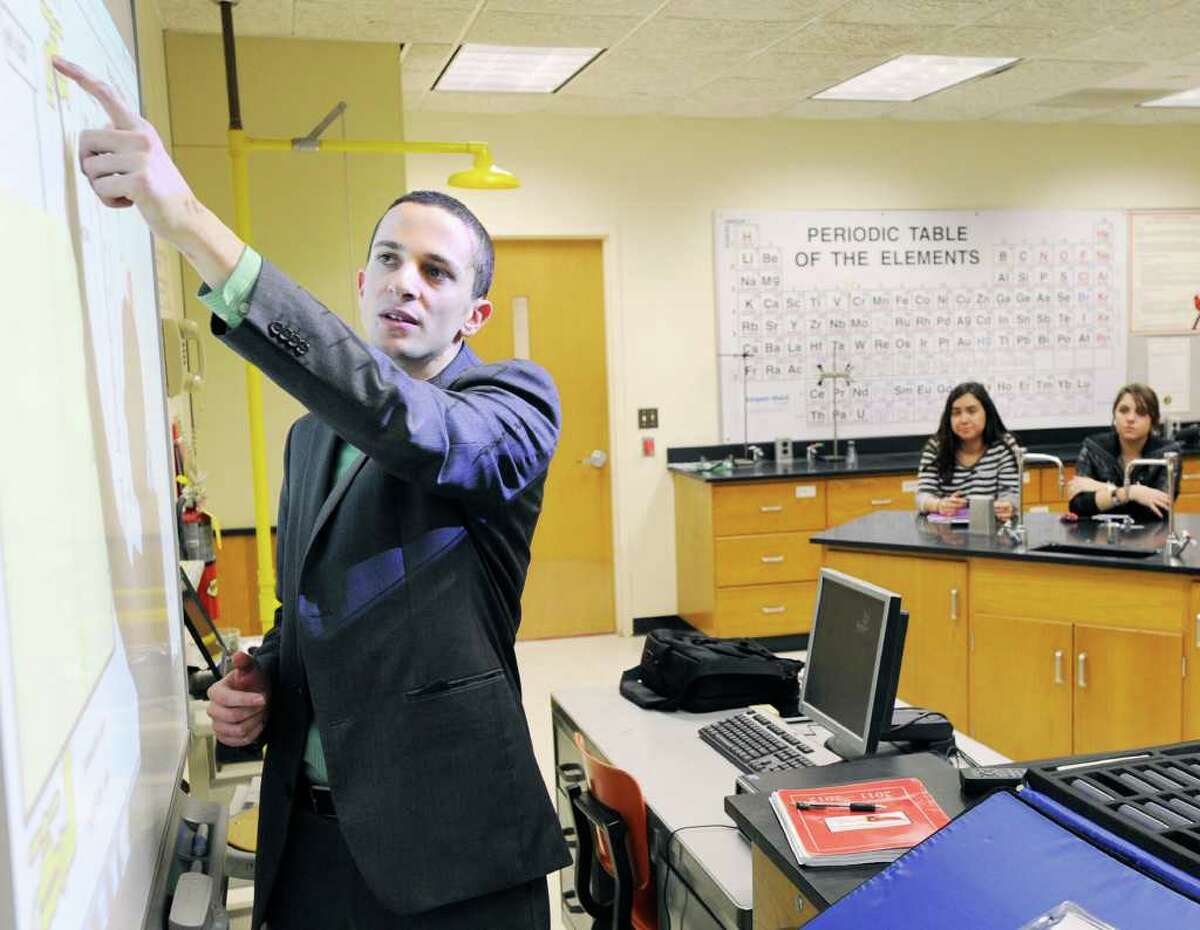 Matt Myers teaches a chemistry class at Greenwich High School Thursday, March 8, 2012. Myers is one of 10 finalists in the Great American Teach-Off, a contest that will award $10,000 to one innovative middle or high school teacher.