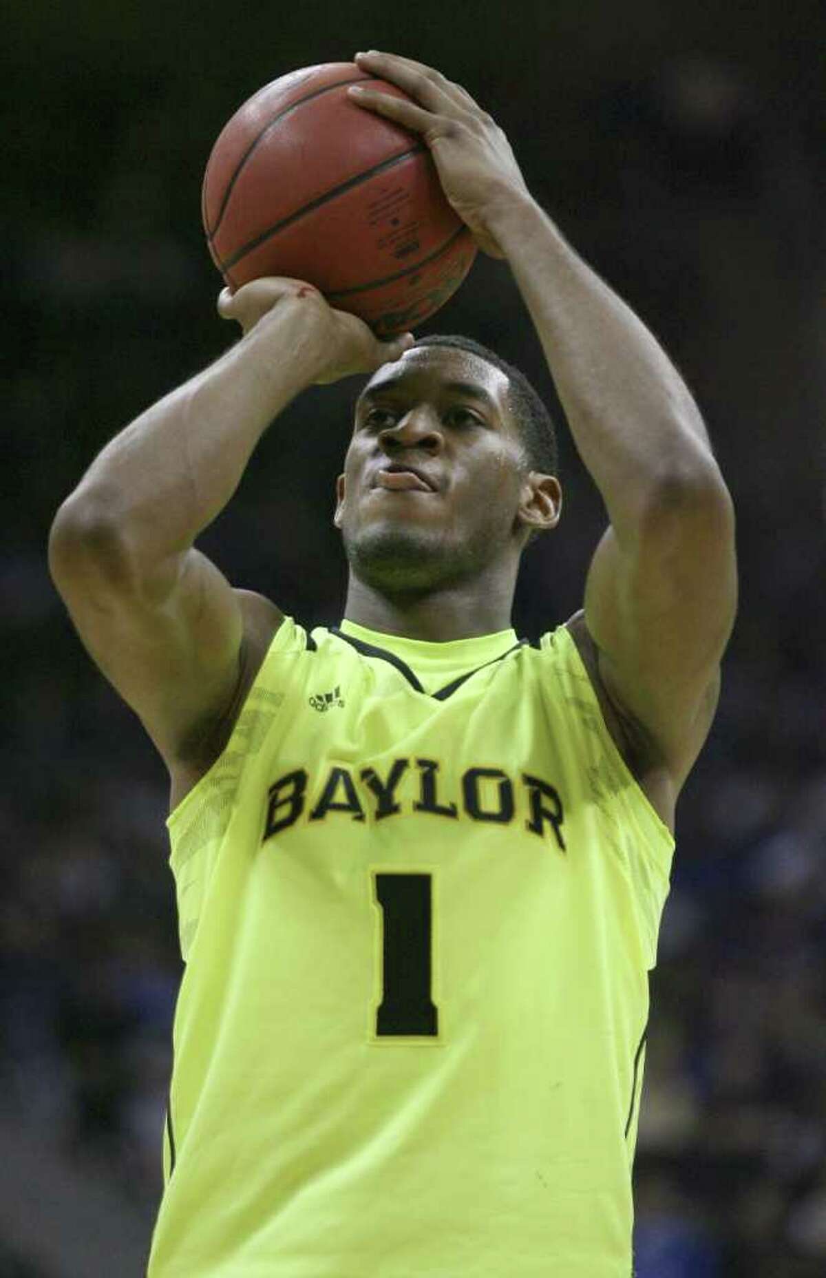 KANSAS CITY, MO - MARCH 08: Perry Jones III #1 of the Baylor Bears shoots a free throw during a game against the Kansas State Wildcats in the quarterfinals of the Big 12 Basketball Tournament March 8, 2012 at Sprint Center in Kansas City, Missouri.