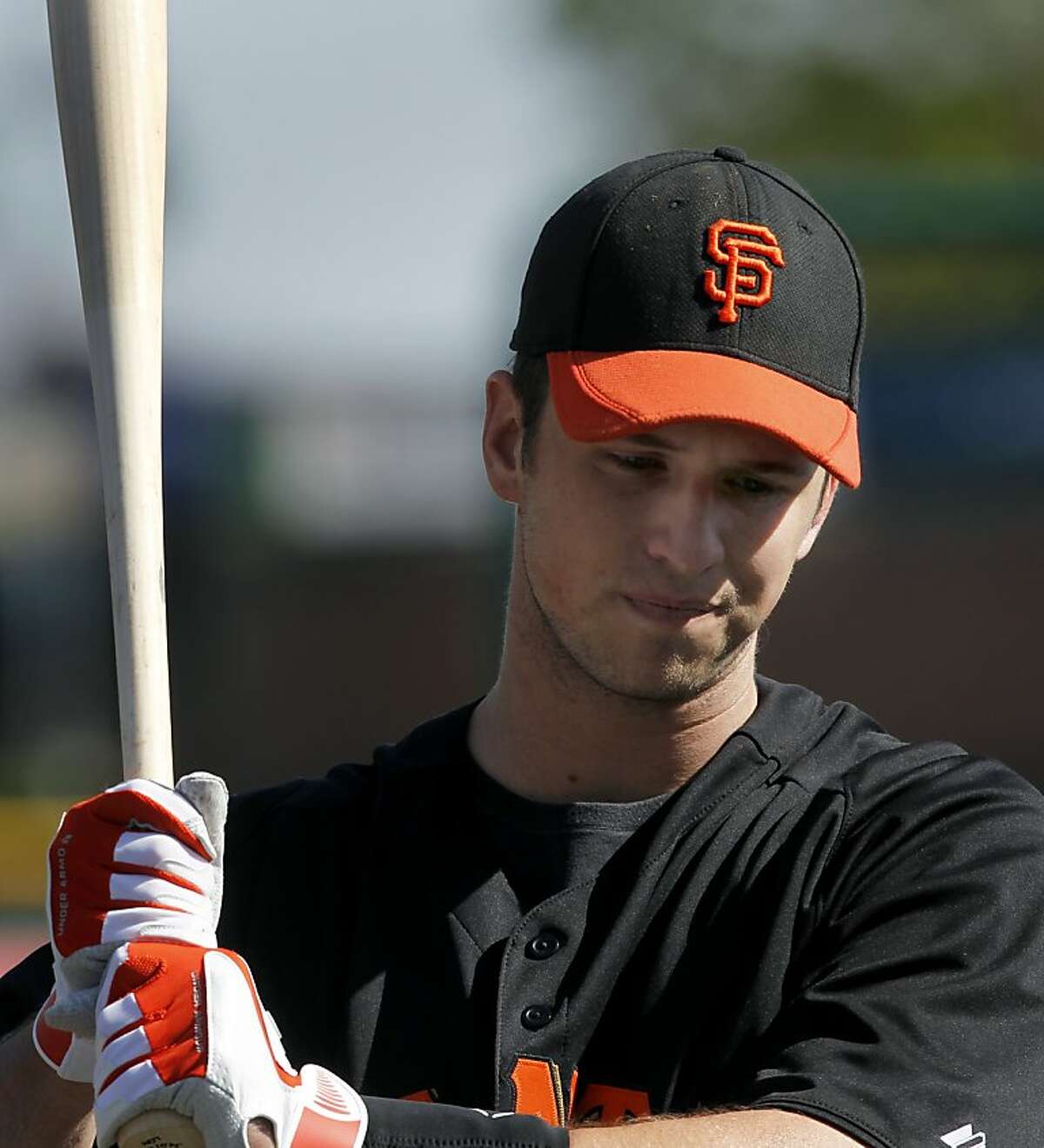 Buster Posey waits to take batting practice during the Giants workout at Scottsdale Stadium in Scottsdale, Ariz. on Thursday, March 8, 2012. Posey is scheduled to play in his first Cactus League game Friday.