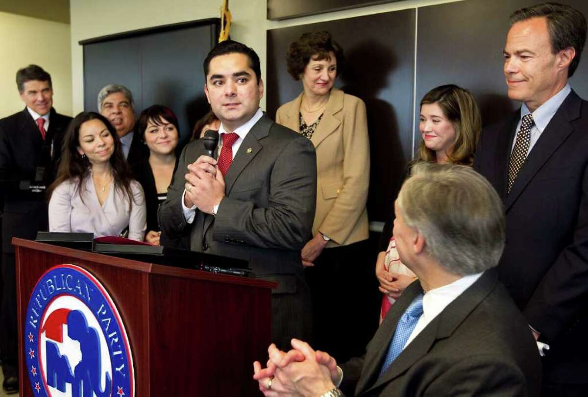 Flanked by family members and GOP notables, Democratic state Rep. J.M. Lozano announces that he’s joining the Republican Party.