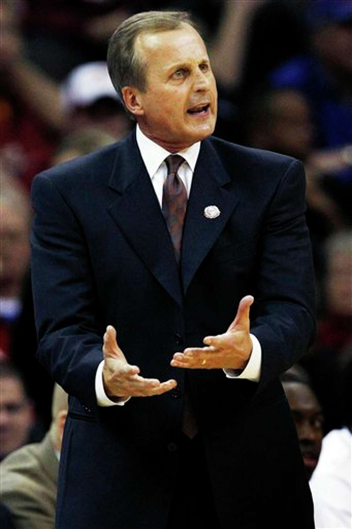 Texas coach Rick Barnes instructs his team during the first half of an NCAA college basketball game against Iowa State in the Big 12 Conference tournament, Thursday, March 8, 2012, in Kansas City, Mo. (AP Photo/Orlin Wagner)