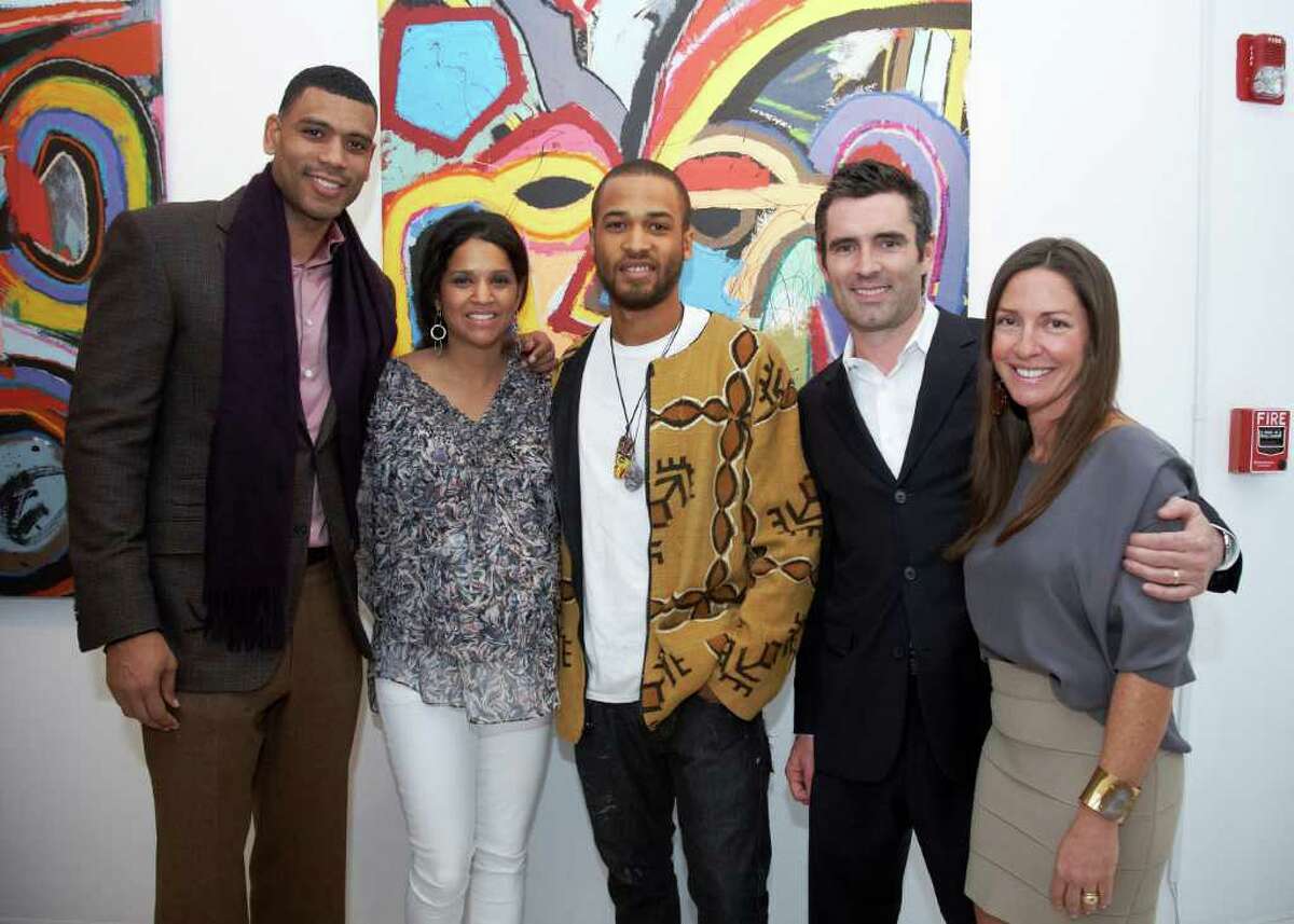 Allan and Tamara Houston, artist Asa Jackson and gallery owners Lee and Cindy Milazzo March 1 at the opening reception for Jackson's "New Works" exhibition at Samuel Owen Gallery in Greenwich.