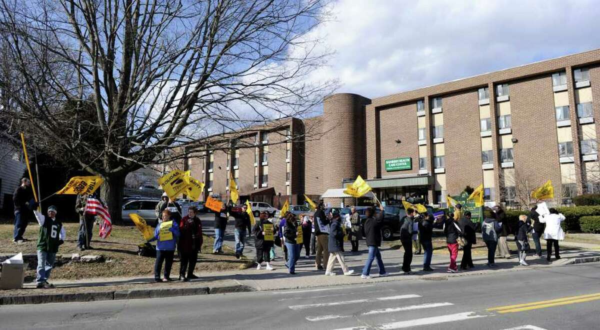 Nursing home workers at Danbury Health Care Center on Osborne Street picketed the facility Friday, March 9, 2012.