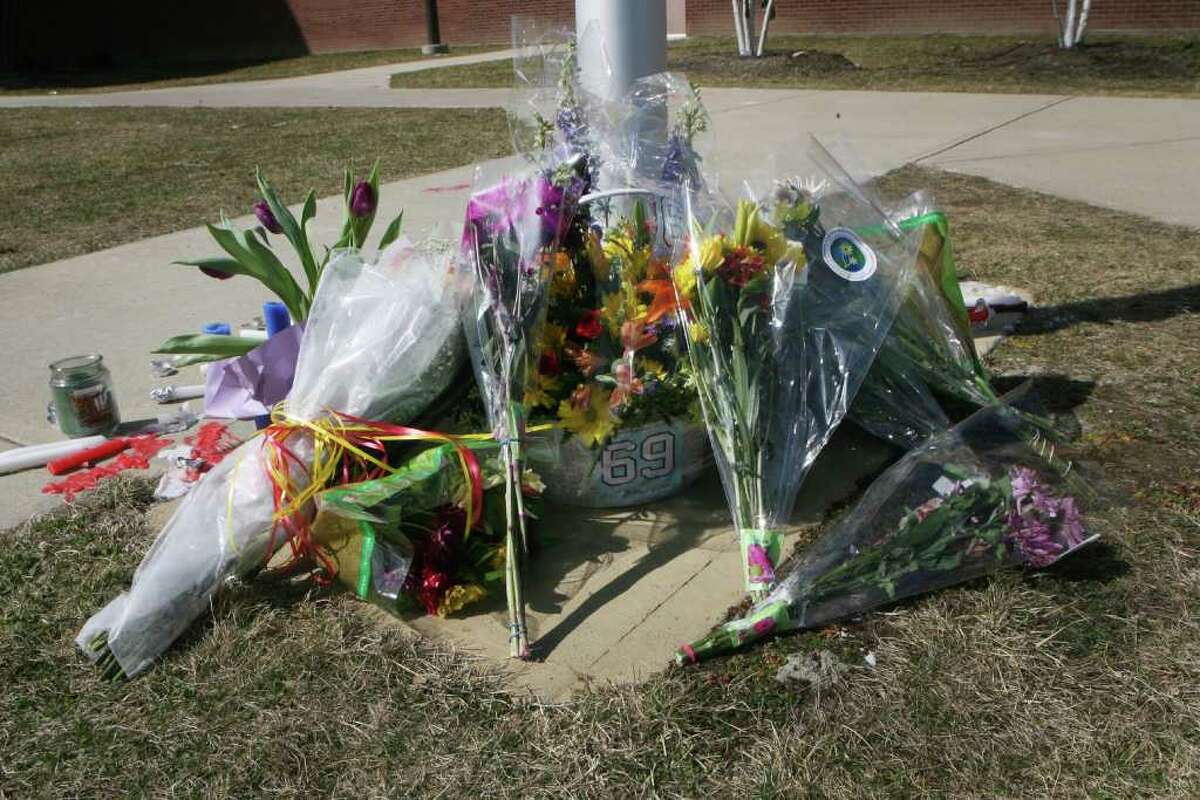 Students create a memorial at Oxford High School in Conn. for sophomore and football player Brandon Giordano on Sunday, March 11, 2012. Giordano died in a car accident in Oxford, Conn. on Friday night.