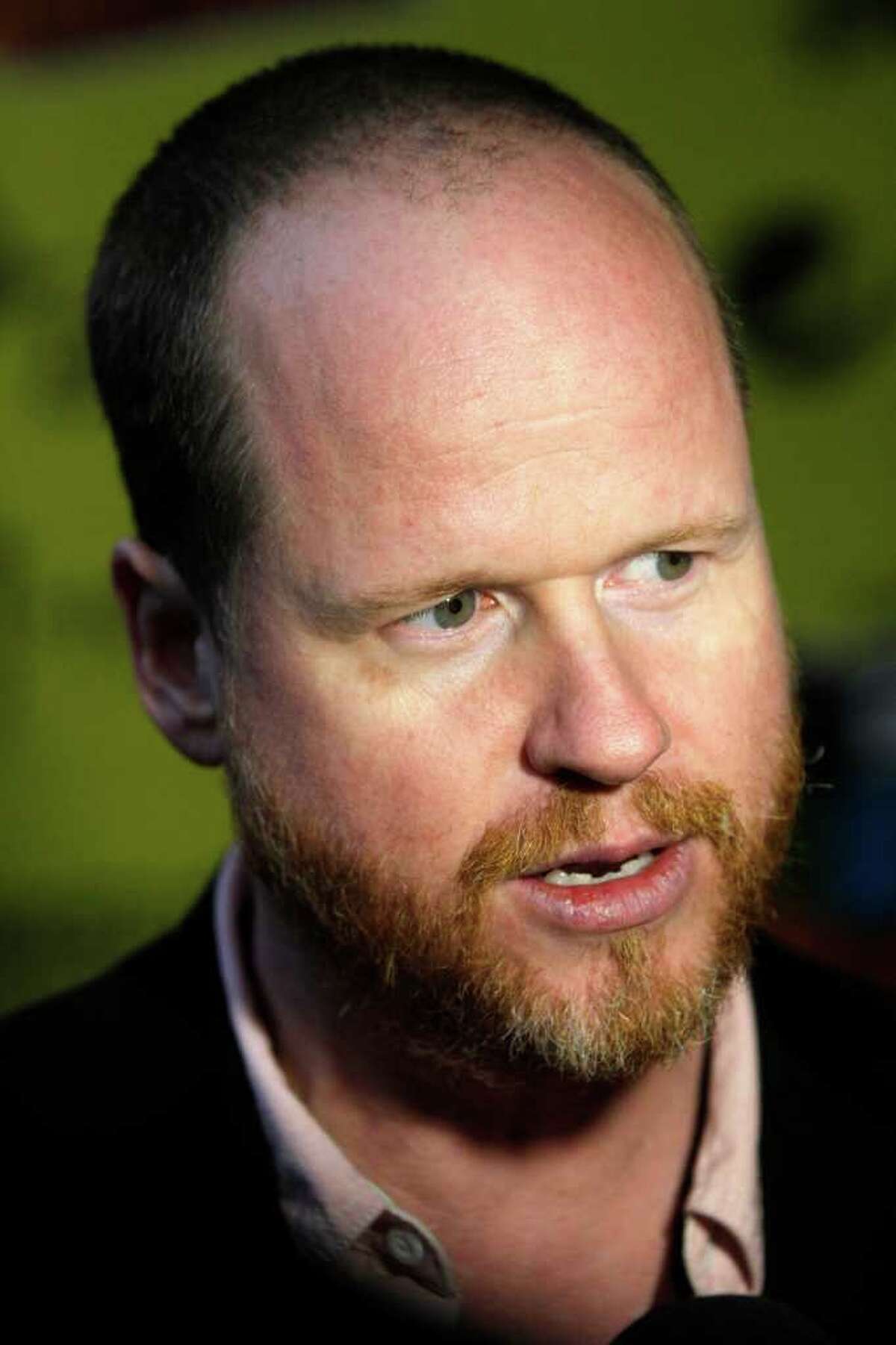 'The Cabin In The Woods' writer Joss Whedon arrives at a screening of the movie at the SXSW Film Festival and Conference in Austin, Texas on Saturday, March 10, 2012.(AP Photo/Jack Plunkett