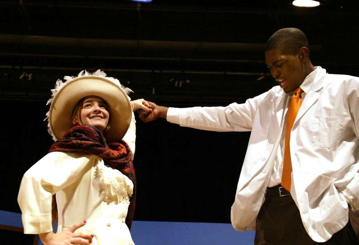 Stratford High School students (L-R) Jillian Valle and Brandon Sherrod rehearse a scene from the school production of Cactus Flower, which opens Friday, Nov. 13, 2009 at the school.Wednesday, Nov. 11, 2009.