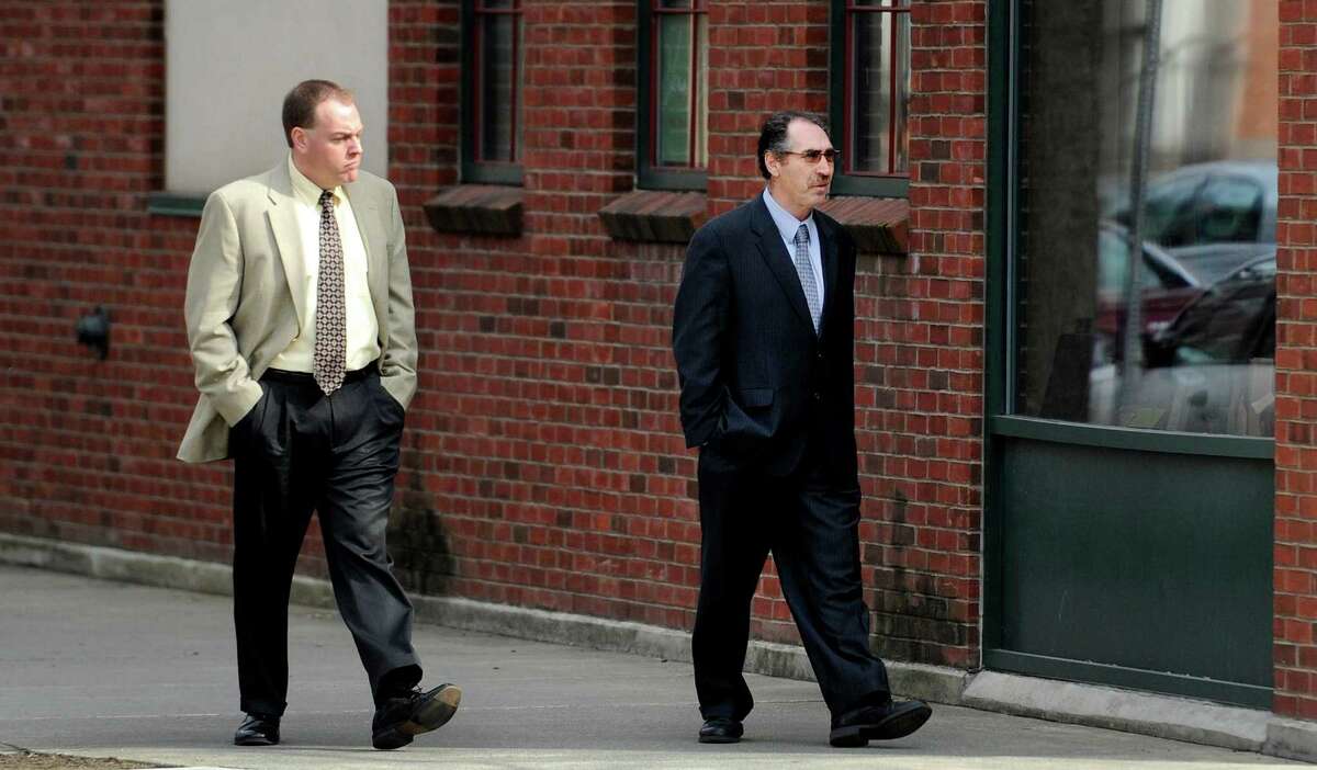 Co-defendants Edward McDonough, left, and Michael LoPorto walk down 2nd Street in Troy, N.Y., Tuesday morning March 13, 2012. Judge George Pulver declared a mistrial in ballot fraud case against McDonough and LoPorto. (Skip Dickstein / Times Union archive)
