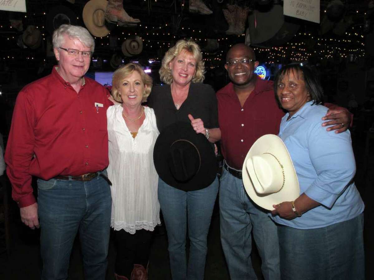 OTS/HEIDBRINK - Board members Reverend Claus Rohlfs, from left, Joanne Sundin, executive director Carol Lockett, board members Vint J. Dockery and Phyllis Bergen-Jackson gather at the Bexar County Detention Ministries, Inc fundraiser at Floore Country Store on 3/1/2012. names checked photo by leland a. outz