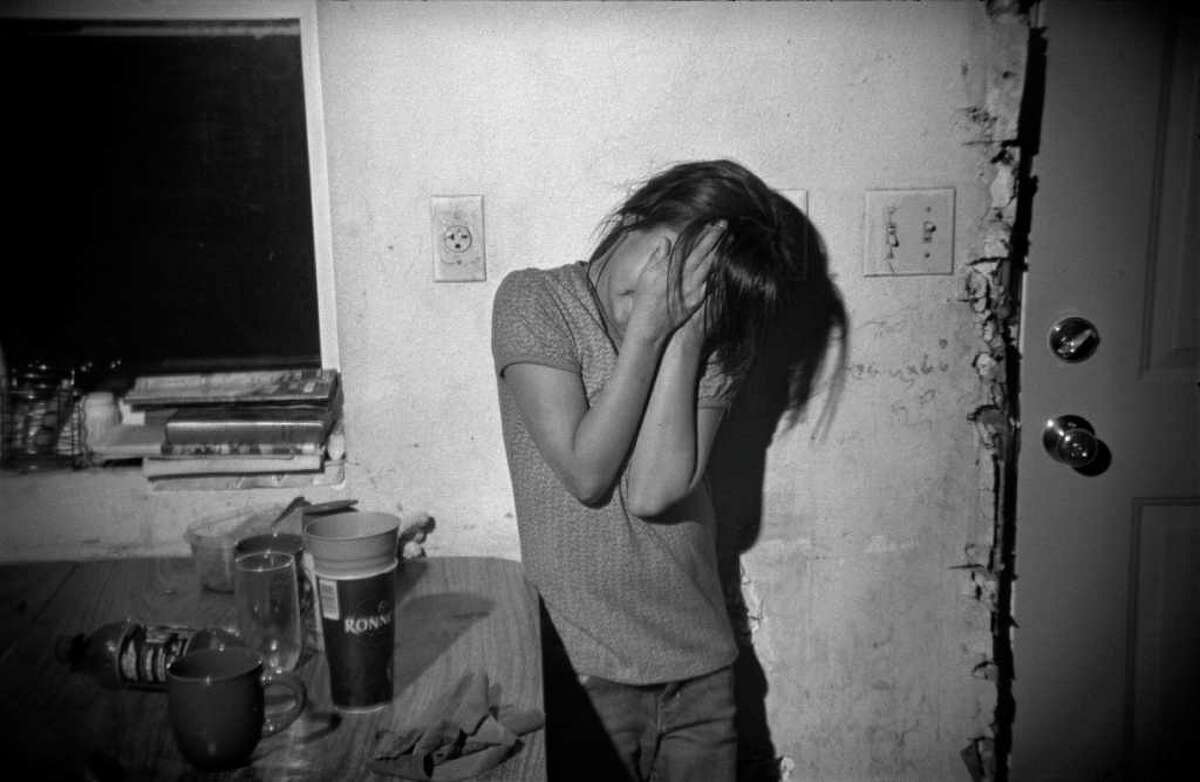 By Danny Wilcox Frazier Pine Ridge Reservation A girl stands in her home in Oglala on the Pine Ridge Reservation, South Dakota. The Pine Ridge Reservation is home to the Oglala Lakota, a tribe once led by the legendary war chief Crazy Horse. Pine Ridge is also where some 300 men, women and children were slaughtered by the U.S. 7th Calvary at the Massacre of Wounded Knee in 1890, the tragic end to the Indian Wars. Lakotas fought the United States to retain the Black Hills, guaranteed to them by treaty, after gold was discovered there in 1874. Originally confined to reservations, Lakotas have long suffered in the poorest region in the United States, southwestern South Dakota. The Oglala Lakotas of Pine Ridge live in conditions rivaling the most impoverished nations in the world. Over 90 percent of the residents live below the federal poverty line, and the unemployment rate hovers between 85 and 90 percent. At least 60 percent of their homes are infested with life-threatening black mold. The tuberculosis rate is eight times the national average. Life expectancy is 48 years for men and 52 for women. This is the legacy of a genocide committed for the advancement of America.