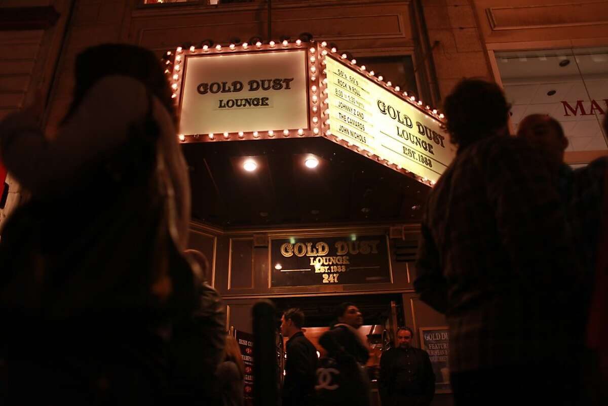 The kiosk at the Gold Dust Lounge lights up Powell Street in February. Last December the owners of the Gold Dust lounge, at 247 Powell Street, received a notice from their landlord to vacate. After a legal fight, the owners closed up on Powell and are moving to Fisherman's Wharf.