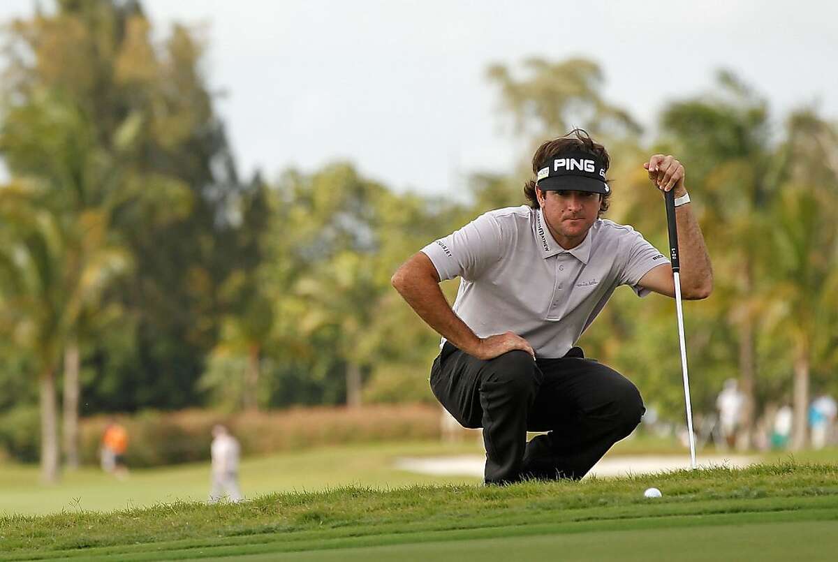 Bubba Watson lines up a putt on the ninth hole during the second round of the 2012 World Golf Championships Cadillac Championship at Doral Golf Resort And Spa on March 9, 2012 in Miami, Florida.