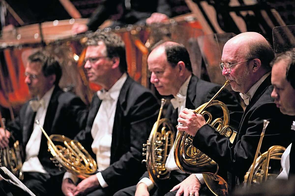Musicians: SF Symphony Horn section, with Principal Bob Ward, playing, second from right.
