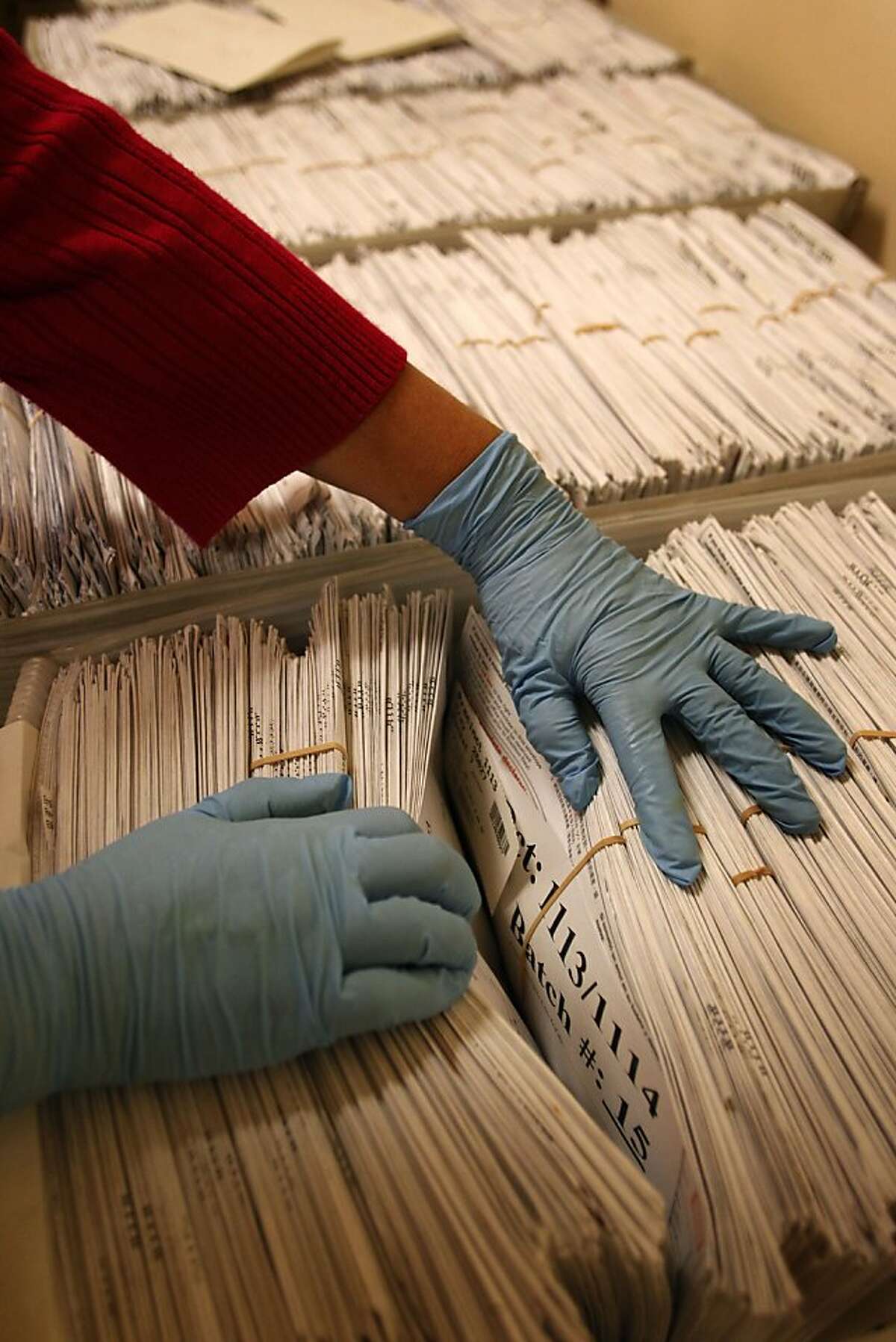The envelopes from mail in ballots are processed at City Hall in the Department of Elections office, on Wednesday November 09, 2011, in San Francisco, Ca.