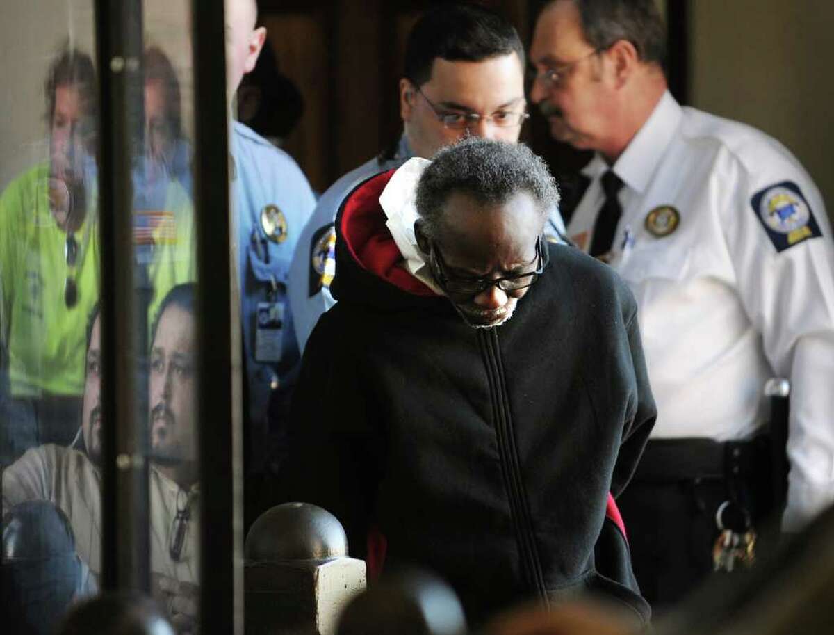 Cargil Nicholson walks with head down as he lead in for his arraignment in the murder of James Cleary, both of Bridgeport, at Superior Court in Bridgeport on Wednesday, March 14, 2012.
