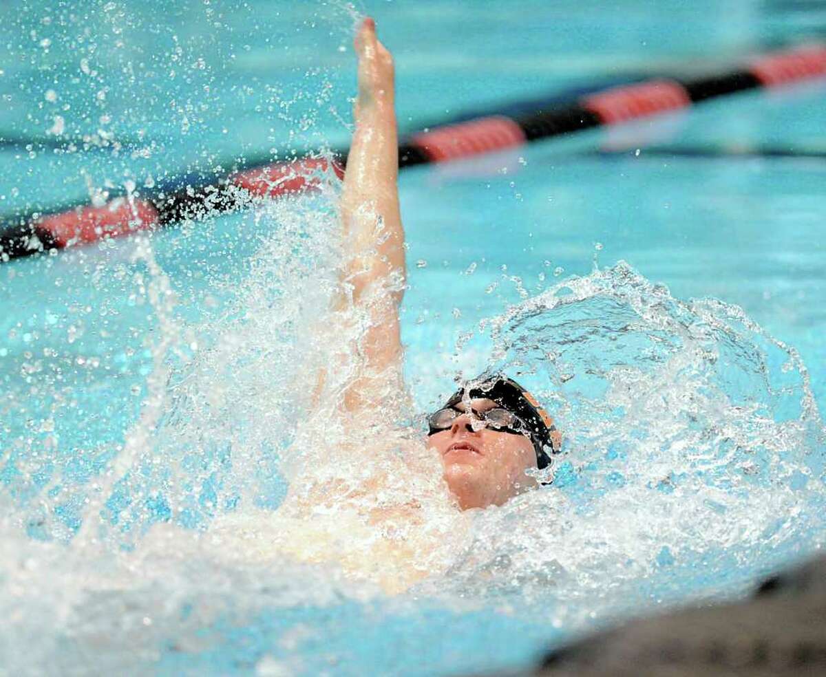 Tim Maloney of Shelton High School swims the backstroke during the CIAC Boys Class L Swimming championships at Wesleyan University in Middletown, Conn., Wednesday, March 14, 2012.