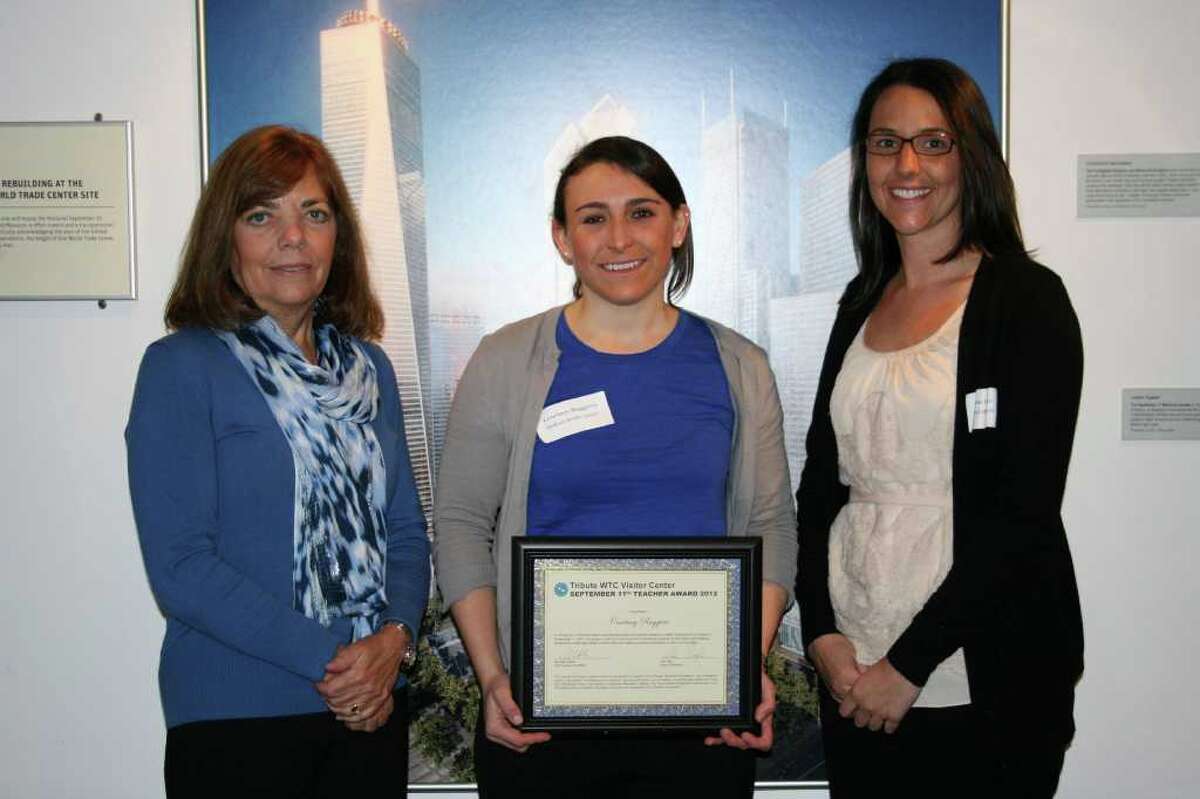 Bedford Middle SChool teachers Laurie Gray, Courtney Ruggiero and Ali Laturnau stand with a certificate of merit from the Tribute WTC Visitor Center in New York City for a 'Spirit of Service' project they implemented this past fall at the school.
