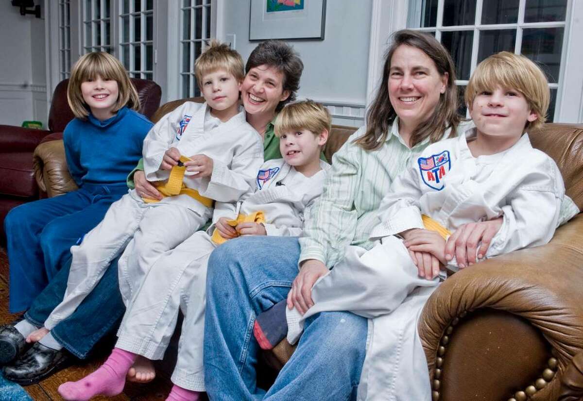 Emily Howell, 9, Tommy Howell, 7, Robin Howell, Aidan Howell, 7, Deborah Neumayer, Harrison Howell, 7, at their home. This is for the anniversary of legal gay marriage story. Tuesday, Nov. 10, 2009