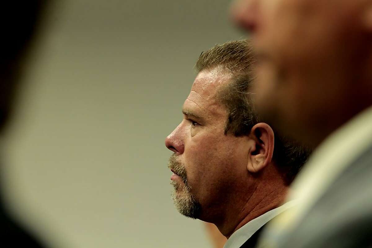 Defendant Norman Wielsch stands up before the judge with Christopher Butler, Stephen Tanabe, and Louis Lombardi to plea not guilty for law enforcement abuse of power, at the Contra Costa Superior Courthouse,Thursday June 23, 2011, in Walnut Creek, Calif.