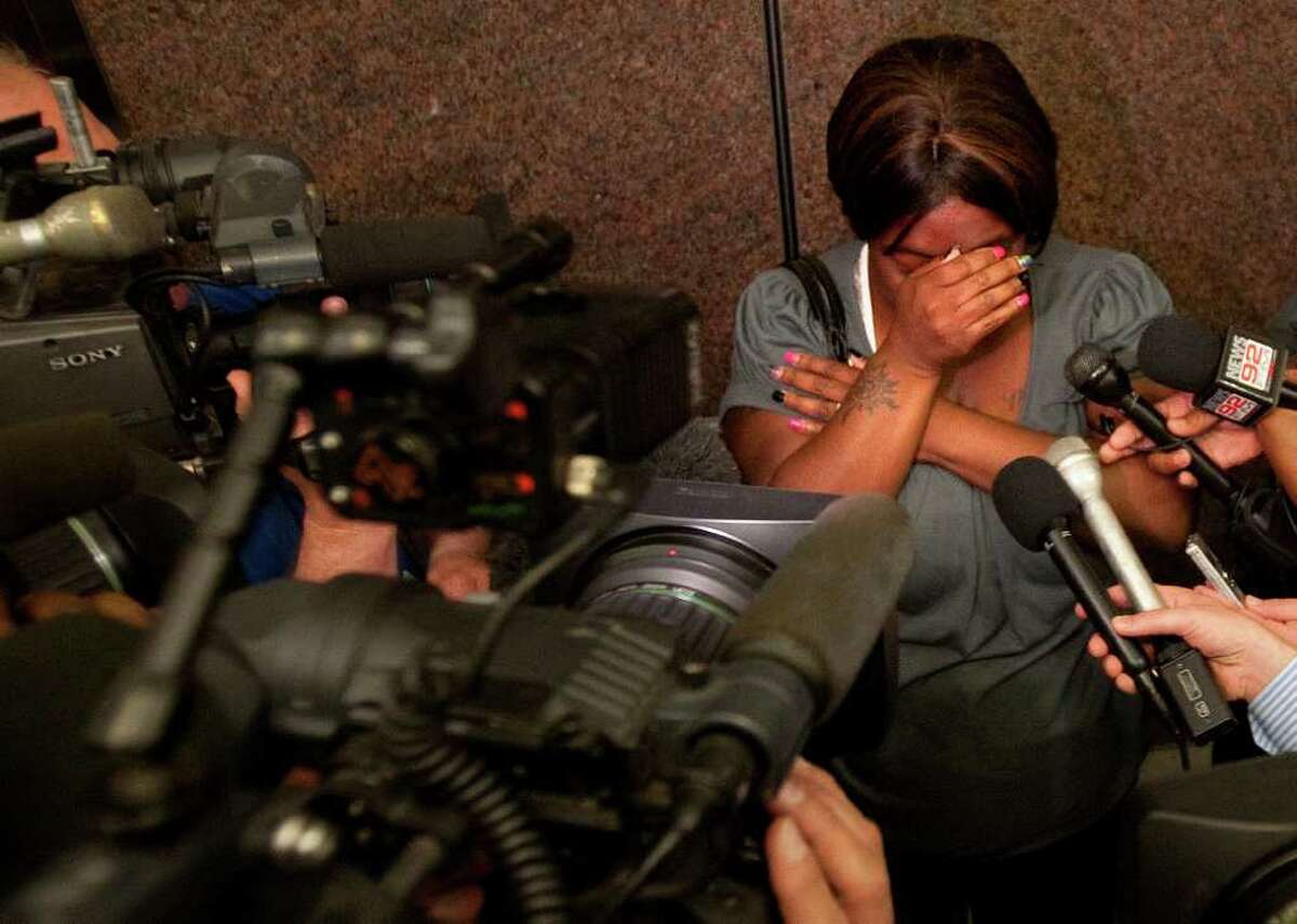 Auboni Champion-Morin is emotional after a Juvenile Court hearing over the alleged kidnapping of her son, Miguel.