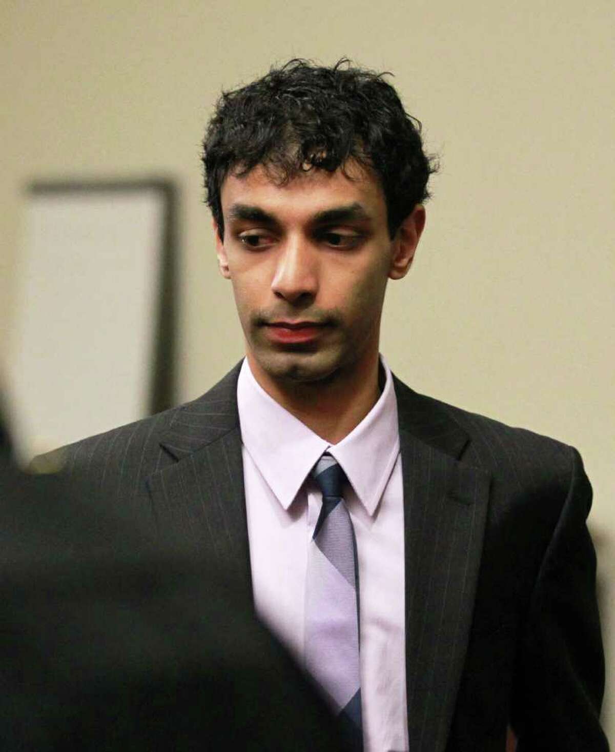 Dharun Ravi leaves the courtroom on Friday, March 16, 2012 at the Middlesex Superior Court in New Brunswick, N.J. Ravi, a former Rutgers University student accused of using a webcam to spy on his gay roommate's love life has been convicted of bias intimidation and invasion of privacy. A jury found that he used a webcam to spy on roommate Tyler Clementi. Within days, Clementi realized he had been watched and jumped to his death from New York's George Washington Bridge in September 2010.