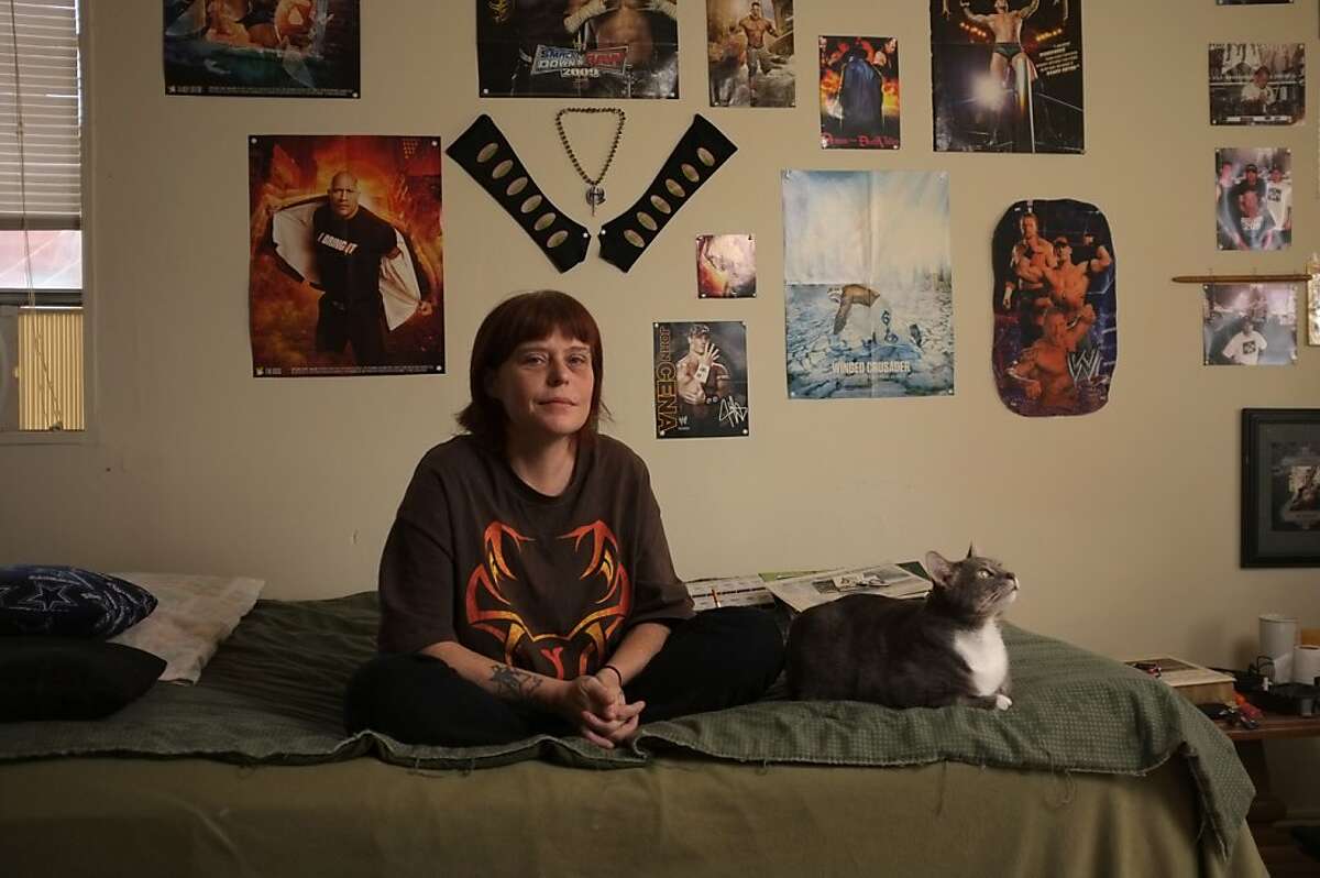 Melissa Huffine Woods is shown in her apartment with her cat Mysterio in Oak Ridge, Tenn. on Friday, March 9, 2012. Woods' aunt Roberta Armtrout was murdered in 1985 and found near the town of Linden. Although it remains an unsolved murder, some people are convinced she was killed by the Speed Freak Killers, Loren Herzog and Wesley Shermantine.