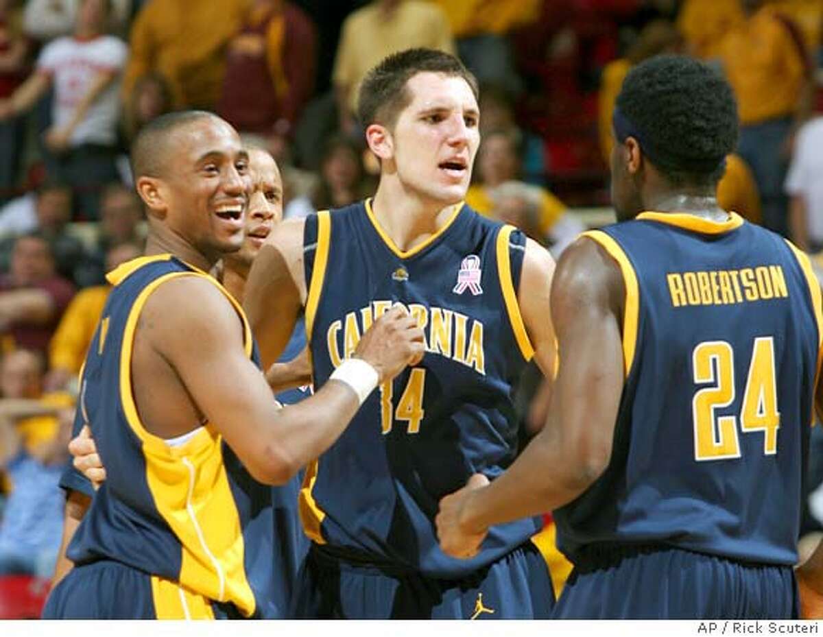 California forward Ryan Anderson, center, and guards Theo Robertson, right, and Omar Wilkes celebrate after California defeated Arizona State 66-62 in overtime during a college basketball game Saturday, Dec. 30, 2006, in Tempe, Ariz. (AP Photo/Rick Scuteri)