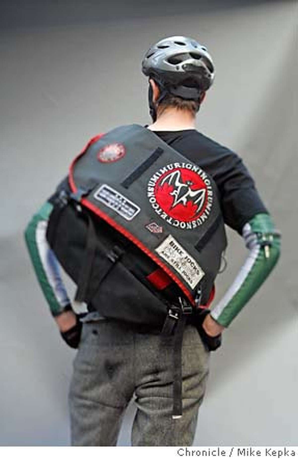 CRITICAL CLASS / Bike messengers sport cool clothes as they wend their