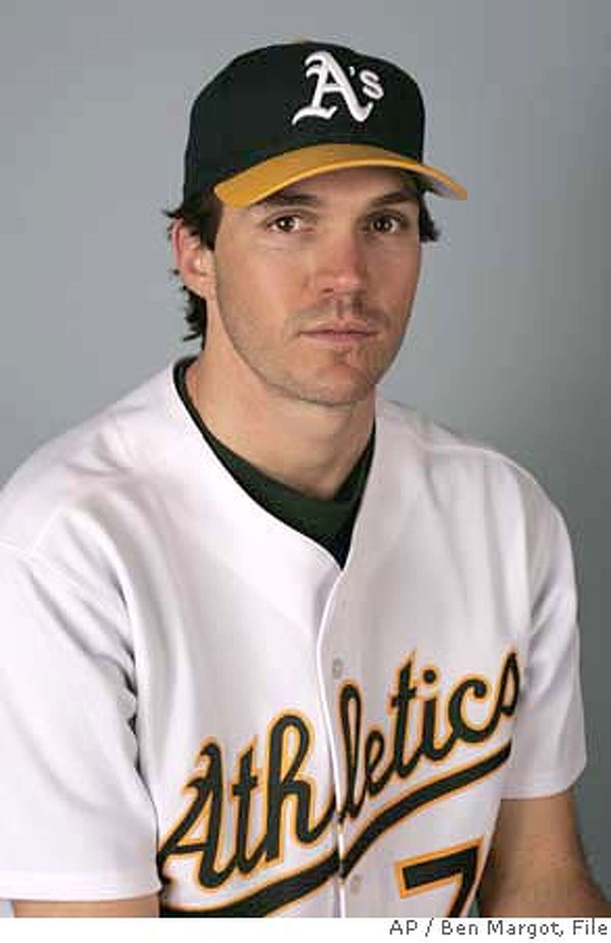 ** FILE ** This is a 2006 file photo of Barry Zito of the Oakland Athletics. Zito and the San Francisco Giants have reached a preliminary agreement on a $126 million, seven-year contract, a person familiar with the negotiations told The Associated Press on Thursday, Dec. 28, 2006. (AP Photo/Ben Margot) A 2006 FILE PHOTO