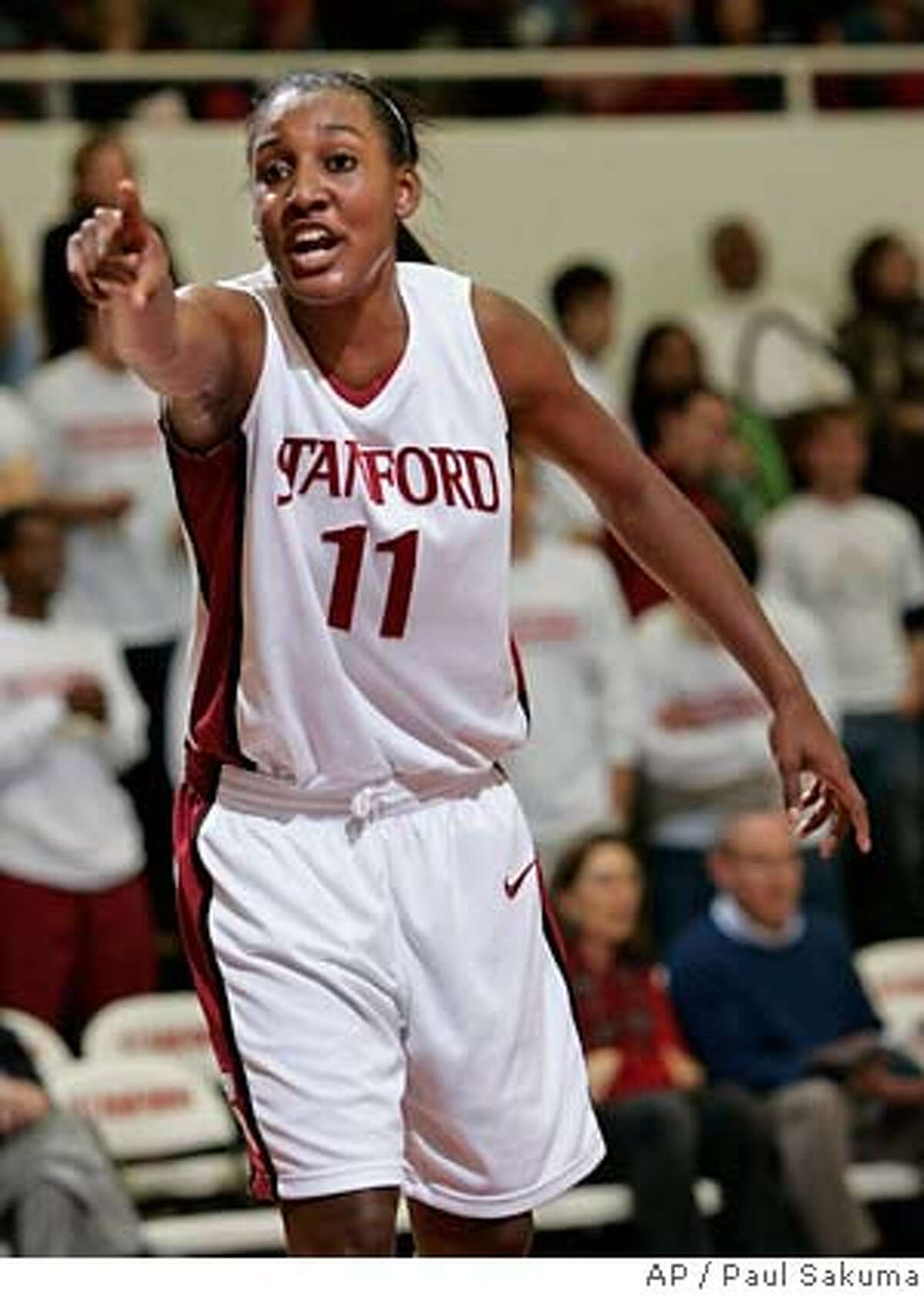 Stanford guard Candice Wiggins (11) points to teammates in the first half against BYU in the second round of the preseason Women's National Invitation basketball Tournament in Stanford, Calif., Monday, Nov. 13, 2006. (AP Photo/Paul Sakuma) Ran on: 11-14-2006 Stanfords Brooke Smith, like the rest of her teammates, found BYU and Dani Kubik Wright (45) to be a roadblock. Ran on: 11-14-2006 Stanfords J.J. Hones (10) and Jayne Appel cant believe what they are seeing in the final minute of the loss.