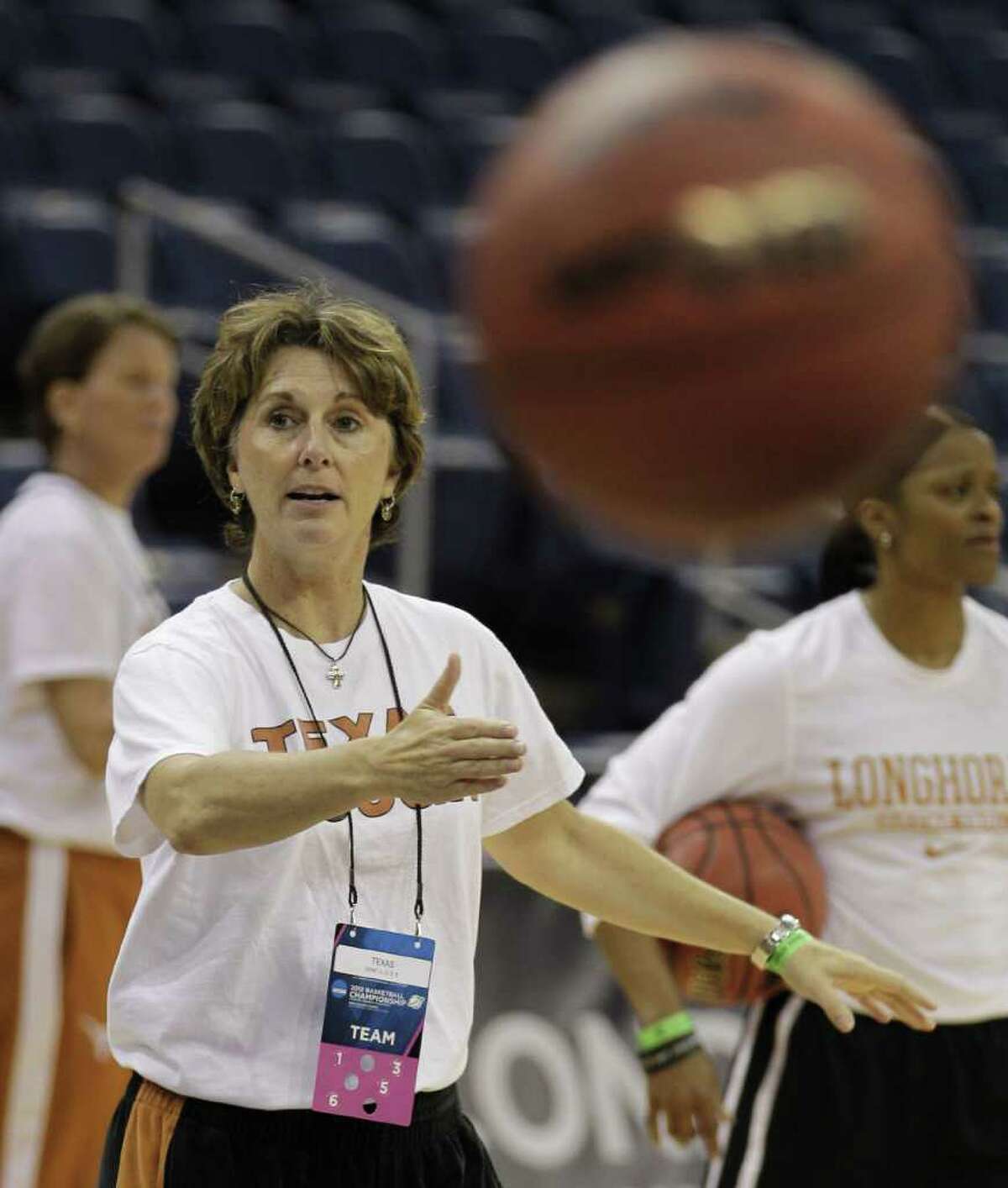Texas head coach Gail Goestenkors directs her team during practice in Norfolk, Va., Friday, March 16, 2012. Texas plays West Virginia in an NCAA tournament first-round women's college basketball game on Saturday. (AP Photo/Steve Helber)