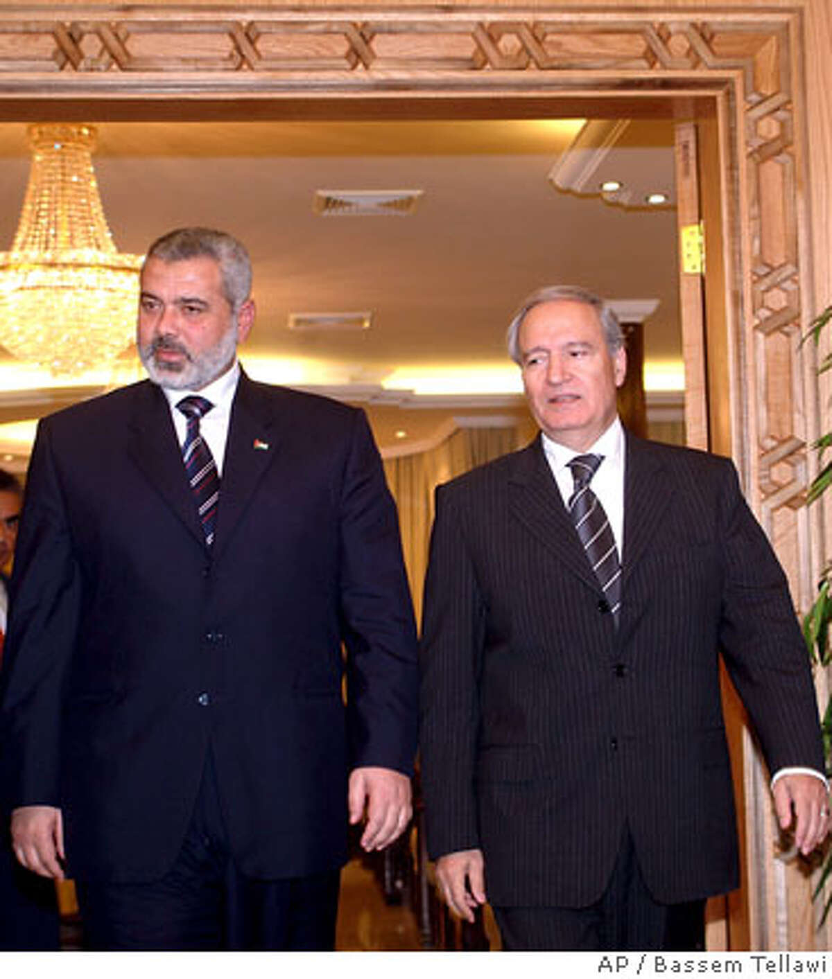 Syrian Vice-President Farouk al-Sharaa, right, meets Palestinian Prime Minister Ismail Haniyeh in Damascus, Monday, Dec. 4, 2006. Haniyeh arrived Sunday for talks with Syrian officials and the leaders of Damascus-based Palestinian factions on faltering efforts toward forming a Palestinian national unity government.