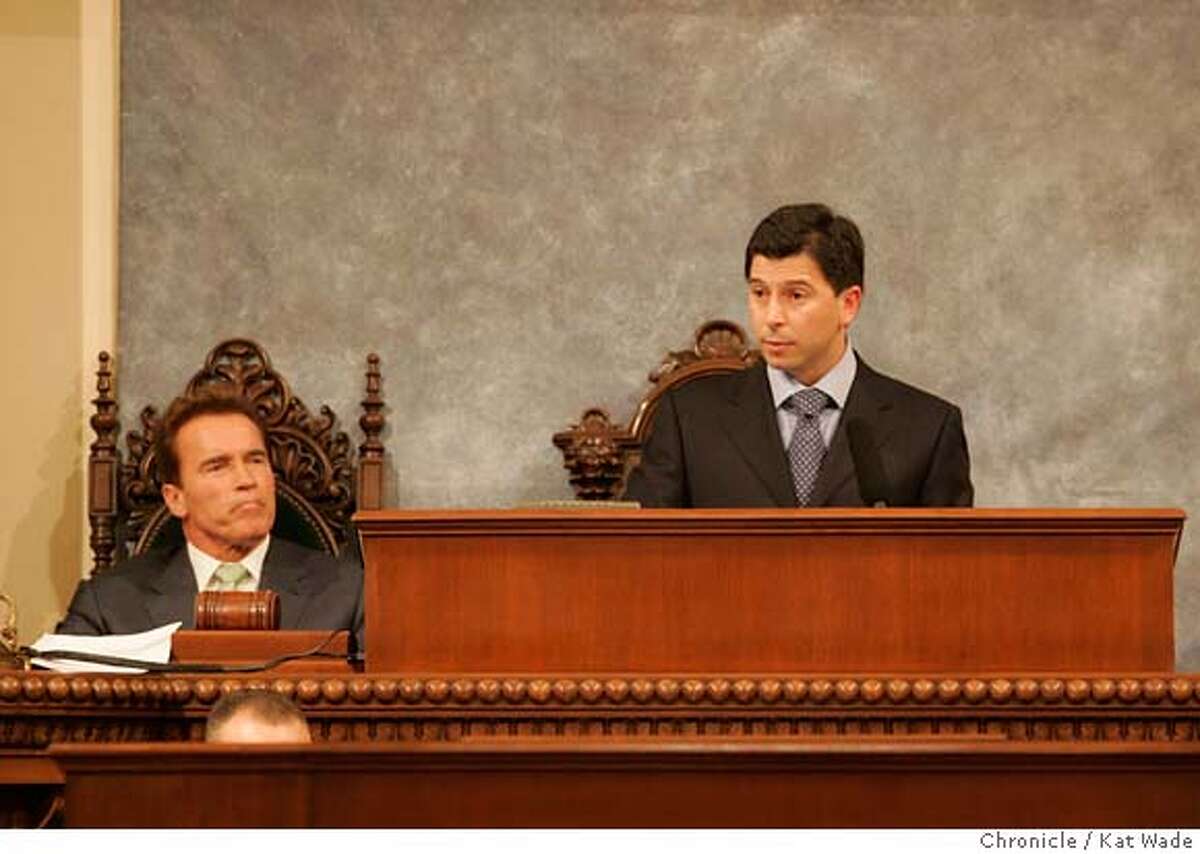 Governor Arnold Schwarzenegger (left) who made a rare appearance for the swearing in of legislature members, listens while re-elected Speaker of the California State Assembly, Fabian Nu�ez, (right)46th district speaks on Monday December 4, 2006 in Sacramento at the official start of the new legislative session