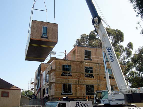 Making the most of a site / Sliver of land becomes home to cozy condos