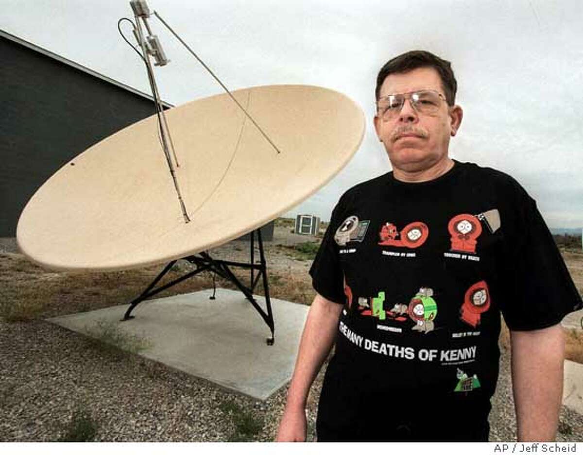 FILE - Radio announcer Art Bell taken at his home in Pahrump, Nev., in this May 12, 1998, file photo. Bell, host of America's most popular overnight radio show, gave his ``final broadcast'' early Tuesday, Oct. 13, 1998, alluding to a mysterious event that occurred to his family about a year ago and has since escalated. ``What you are listening to, is my final broadcast (AP Photo/Jeff Scheid). ``COAST TO COAST'' Ran on: 11-12-2006 George Noory hosts Coast to Coast AM, a late-night radio show that attracts fringe conspiracy theorists and mainstream listeners alike. Ran on: 11-12-2006 George Noory hosts Coast to Coast AM, a late-night radio show that attracts fringe conspiracy theorists and mainstream listeners alike. Ran on: 11-12-2006 George Noory hosts Coast to Coast AM, a late-night radio show that attracts fringe conspiracy theorists and mainstream listeners alike.