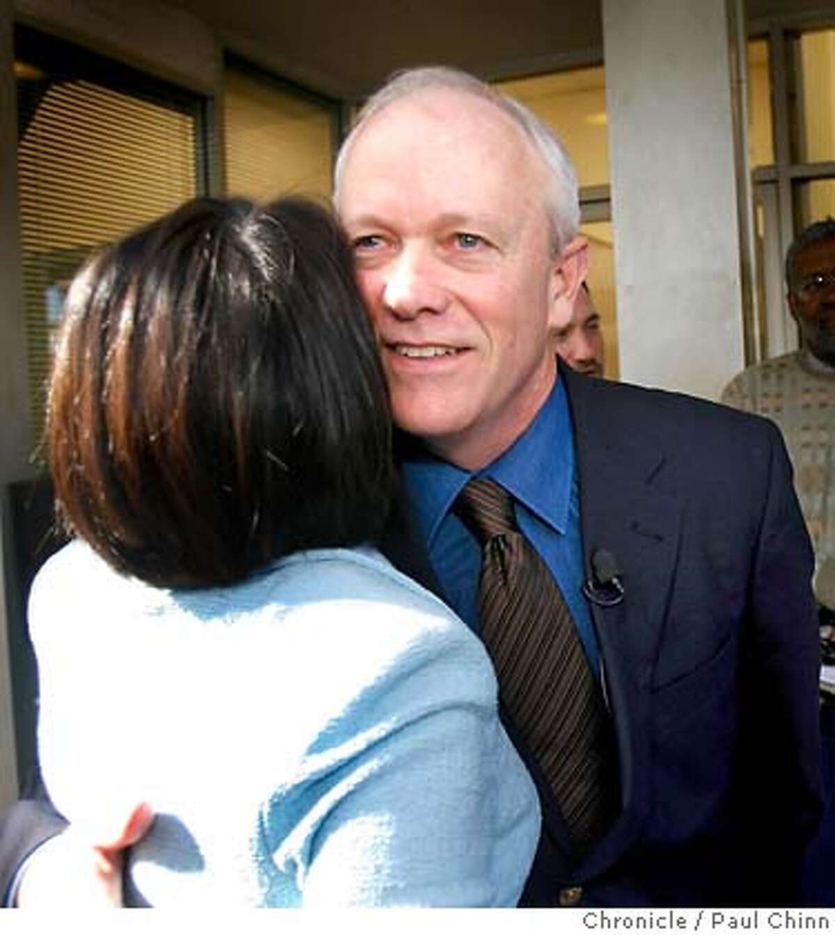 A supporter hugs Jerry McNerney at a Democratic Party victory rally in Oakland, Calif. on Wednesday, Nov. 8, 2006. McNerney defeated incumbent Rebublican Richard Pombo in the 11th district Congressional race. PAUL CHINN/The Chronicle **Jerry McNerney, Richard Pombo